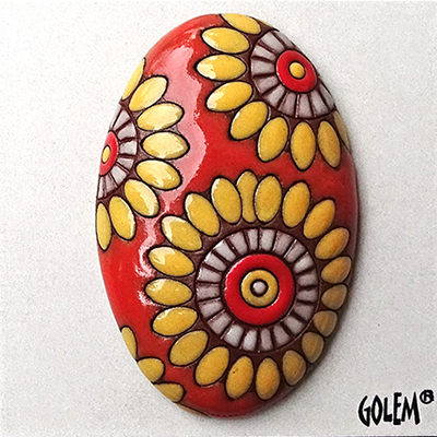 oval domed cabochon, large flowers on orange