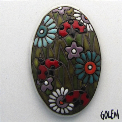 dark oval cabochon, daisees & ladybugs