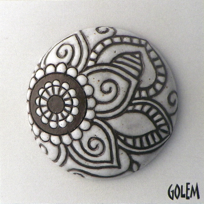 Paisley, domed round, white on dark