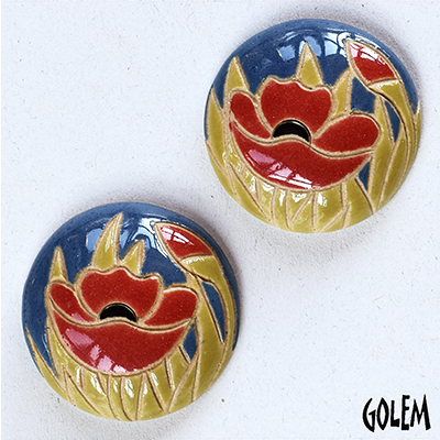 2 small round cabochons, red poppies on blue