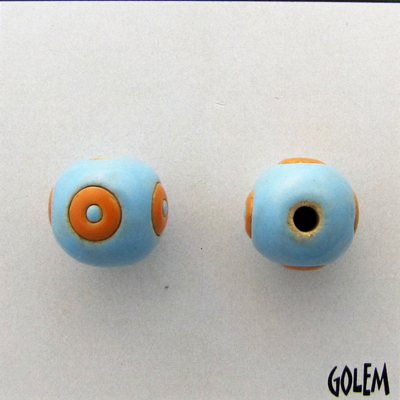 Orange circles on turquoise background