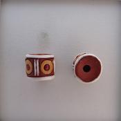 Yellow circles/white lines on terracotta