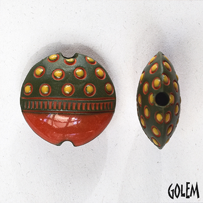 Yellow circles on dark green, lentil bead size M