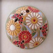 round pendant with ladybugs and white fl