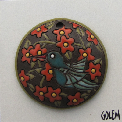 Dark pendant with humingbird