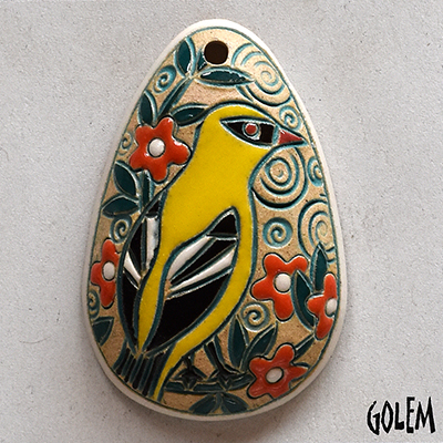 oval pendant with yellow bird