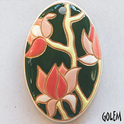Blooming Magnolia on deep green -long oval pendant