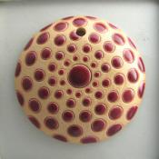 round, burgundy circles on white backgro