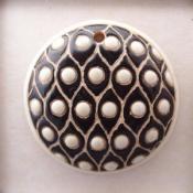 round, patern with white circles on blac