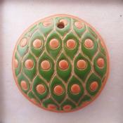 orange dots on green background