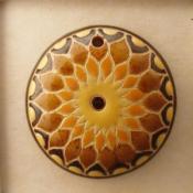 sun design in yellow, orange and tan