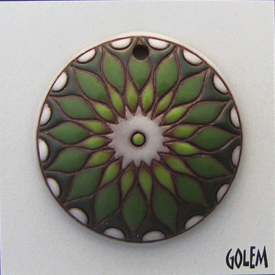 sun design in green & white on terracotta