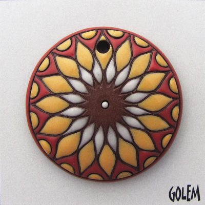 Sun design in yellow & orange on terracotta