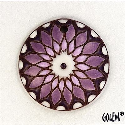 Sun design in purple on terracotta