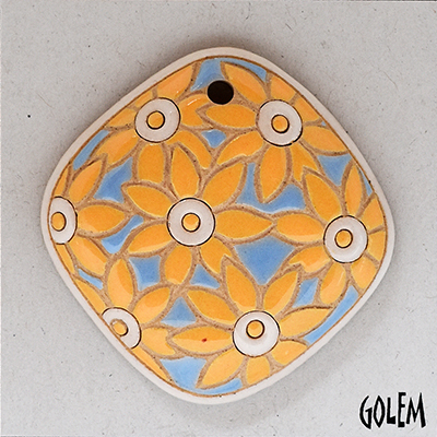 Yellow flowers on blue, oval diamond pendant