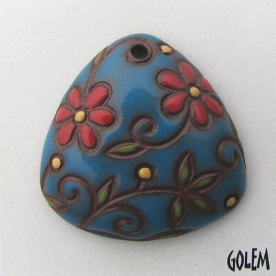 Triangle pendant, blue on terracotta