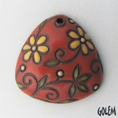 Triangle pendant, salsa on terracotta