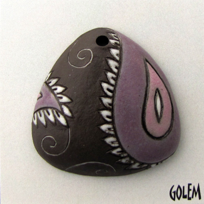 Paisley, domed triangle, purple on dark clay