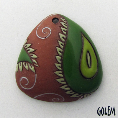 Paisley, domed triangle, green on terracotta