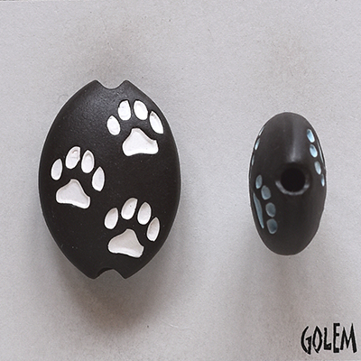 Paw Stamp, white on dark, almond bead size M