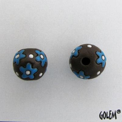 neon blue flowers on dark clay