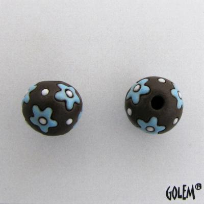 turquoise flowers on dark clay