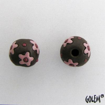 pink flowers on dark clay
