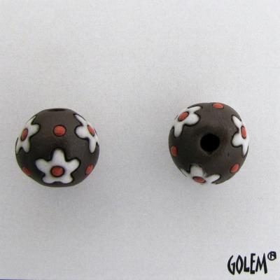 white flowers on dark clay