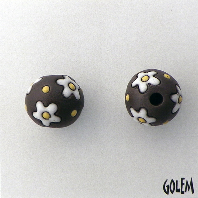 white flowers on dark clay
