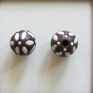 White leaves and dots on dark