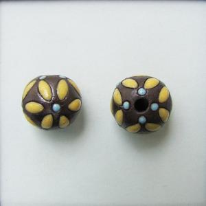 yellow leaves, blue dots on dark