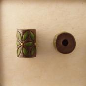 tube bead, green leaves on dark