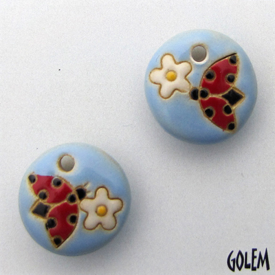Ladybug & flower on blue