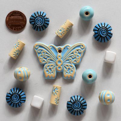 Butterfly Pendant & matching lentil beads