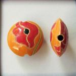 Red poppies on orange, lentil bead size M
