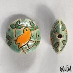 Yellow bird on green - lentil bead size M