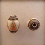 Oval. Br Stripe, Or & Wht triangles, str