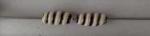 oval bead, spiral design, B&W