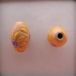 Oval, yellow flower design