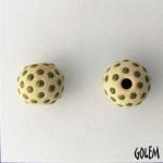 Dark green dots on tan