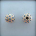 medium blue dots on offwhite, string of 