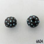 Turquoise polka dots on dark