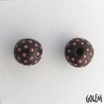 Pink polka dots on dark