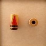 coral & yellow triangles, brown stripe -