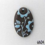 Light blue on dark, small oval