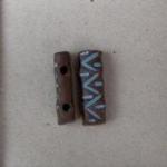 turquoise pattern on 2-hole bead