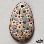 oval pendant with blooming tree