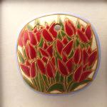 square pendant with red tulips