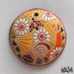 round pendant with snail and flowers