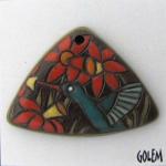 Humming bird & orange flowers on dark
